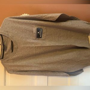 a vintage natutica shirt with blue and black details